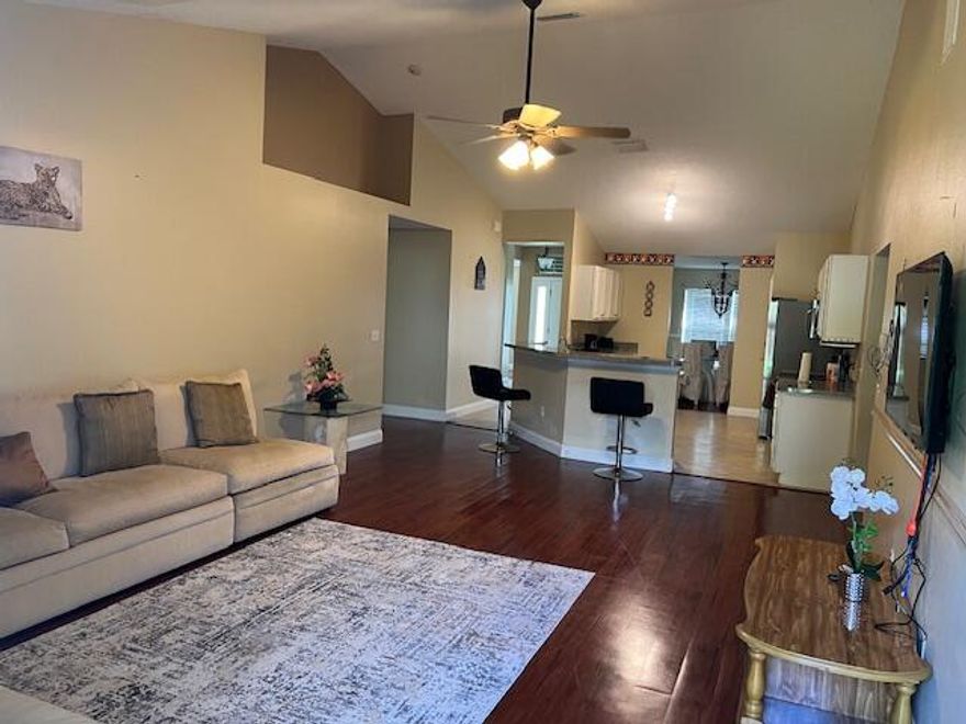 Discover the space and comfort you've been looking for in this 4bedroom, 3bath CBS home with a large den that can easily serve as a 5th bedroom or office. Featuring dual living rooms, a formal dining area, and a split floor plan, this home offers flexibility for families, guests, or multigenerational living. The roof was replaced in 2022, and the fully fenced backyard includes fruit trees and plenty of room for outdoor entertaining. Located in a quiet, desirable area of Port St. Lucie with easy access to shopping, schools, and major roadways. Recently priceimproved and ready for its next owner — schedule your showing today.