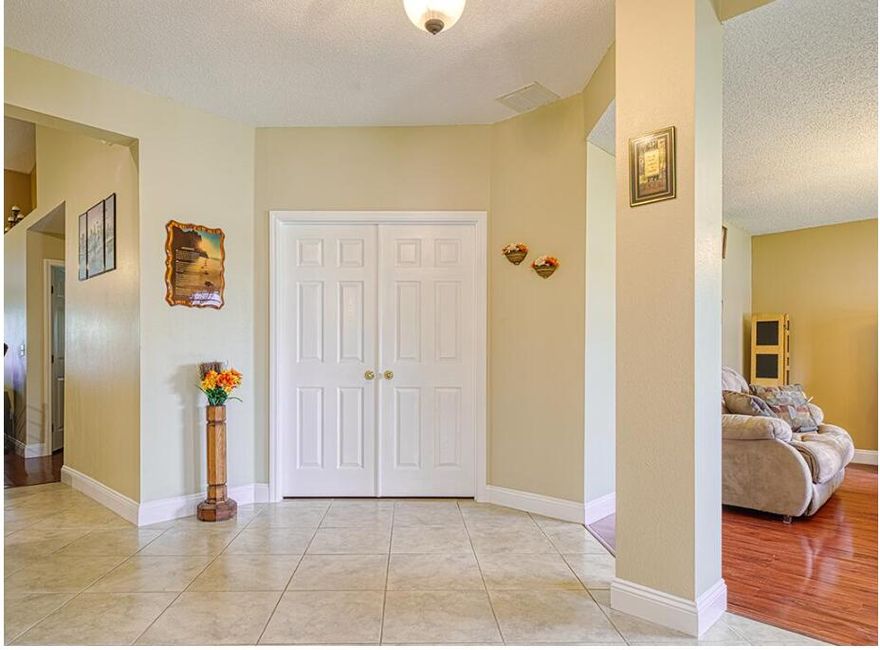 Discover the space and comfort you've been looking for in this 4bedroom, 3bath CBS home with a large den that can easily serve as a 5th bedroom or office. Featuring dual living rooms, a formal dining area, and a split floor plan, this home offers flexibility for families, guests, or multigenerational living. The roof was replaced in 2022, and the fully fenced backyard includes fruit trees and plenty of room for outdoor entertaining. Located in a quiet, desirable area of Port St. Lucie with easy access to shopping, schools, and major roadways. Recently priceimproved and ready for its next owner — schedule your showing today.