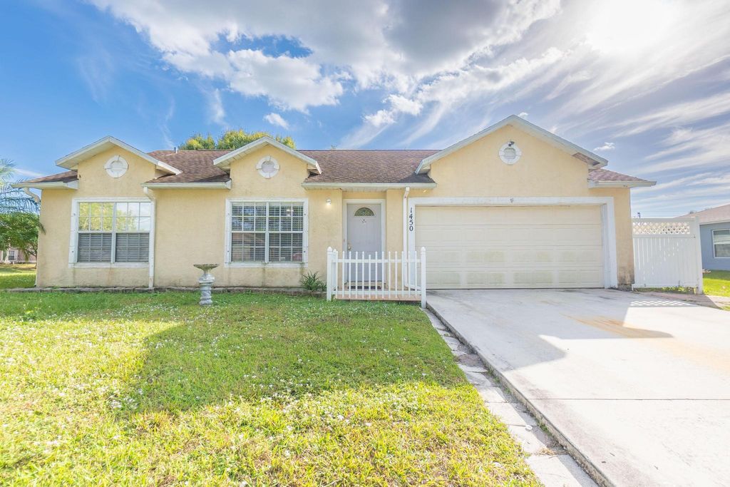 Photo of 1450 SW Gadsan Avenue, Port Saint Lucie, FL 34953 (MLS # R10913453)