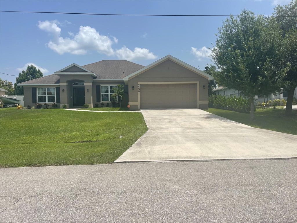 Photo of 4409 SW Gagnon Rd, Port Saint Lucie, FL 34953 (MLS # F10415823)