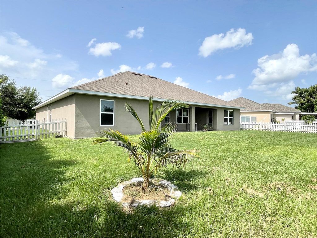Photo of 4409 SW Gagnon Rd, Port Saint Lucie, FL 34953 (MLS # F10415823)