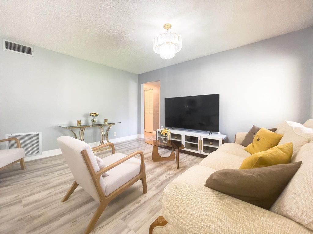 Photo of 340 Knotty Pine Circle #B2, Greenacres, FL 33463 (MLS # F10530327)