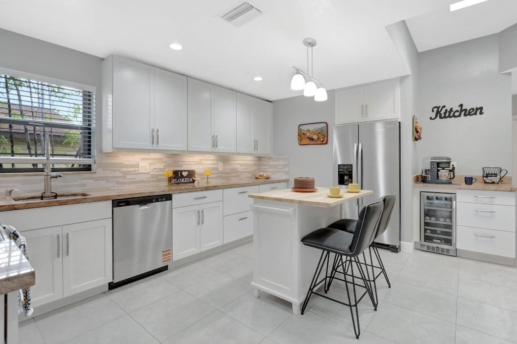 Photo of 2055 Deer Creek Woodlands Way #2055, Deerfield Beach, FL 33442 (MLS # F10499267)