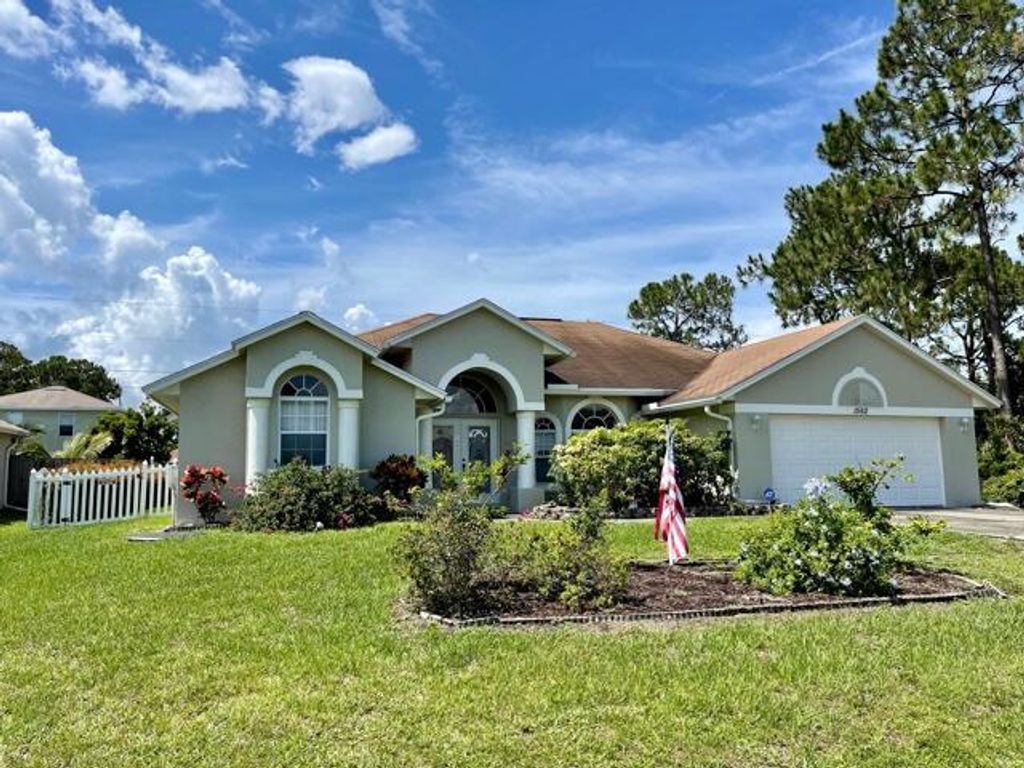 Photo of 1562 SW Meridian Avenue, Port Saint Lucie, FL 34953 (MLS # R10725679)