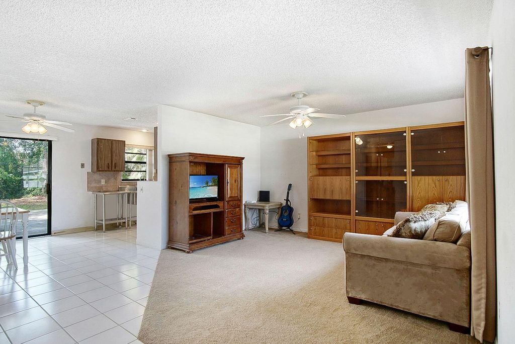 Photo of 1512 SW Bermel Avenue, Port Saint Lucie, FL 34953 (MLS # R11116209)