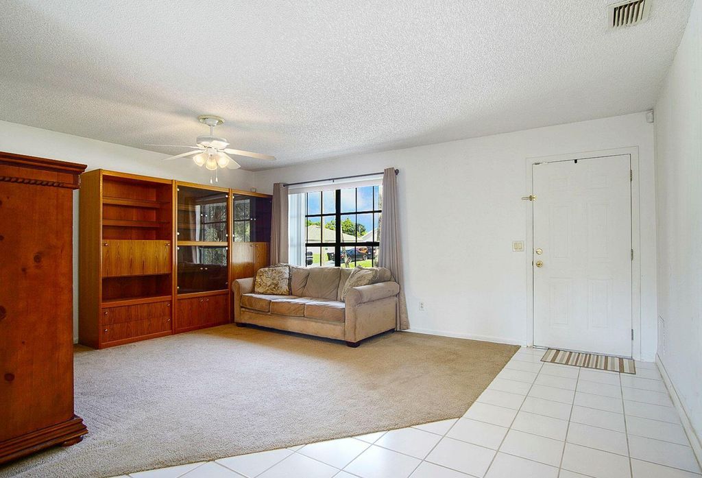 Photo of 1512 SW Bermel Avenue, Port Saint Lucie, FL 34953 (MLS # R11116209)