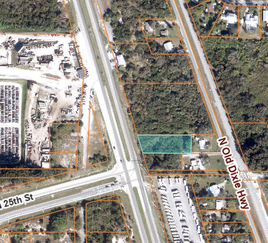 .69 acre lot in prime location on US Highway 1. Located on the east side of US1 with Old Dixie to the east. Just north of the N 25th Street intersection with Milton. Second lot up from Milton Road.