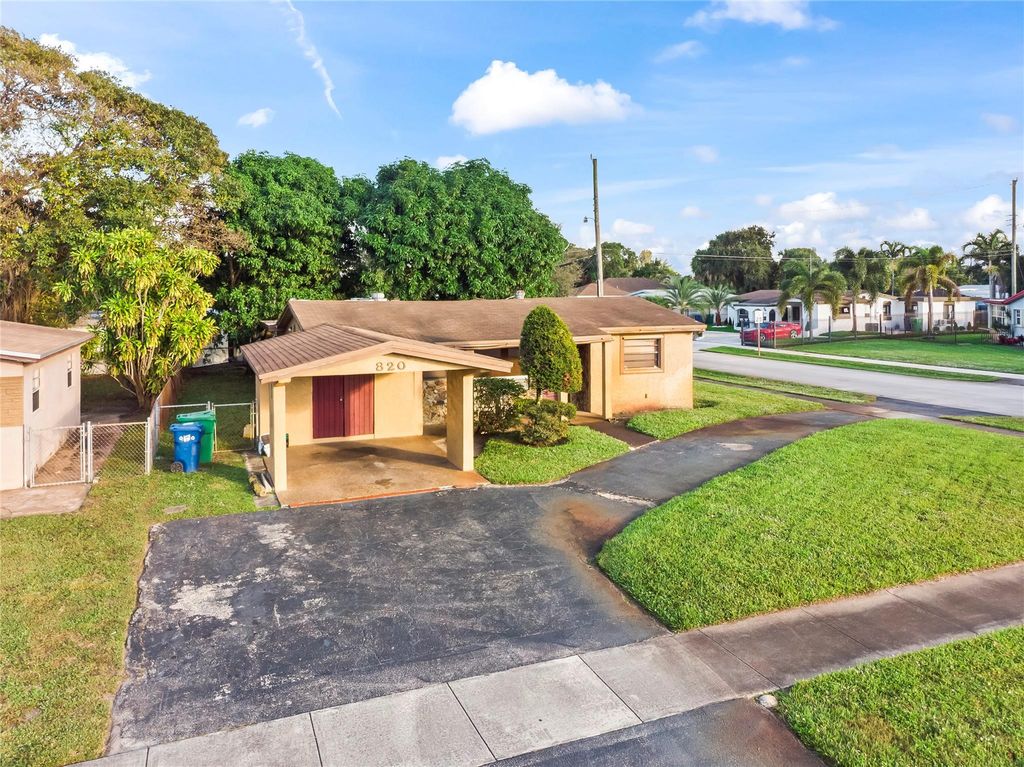 Photo of 820 NW 38th Ave, Lauderhill, FL 33311 (MLS # F10542479)