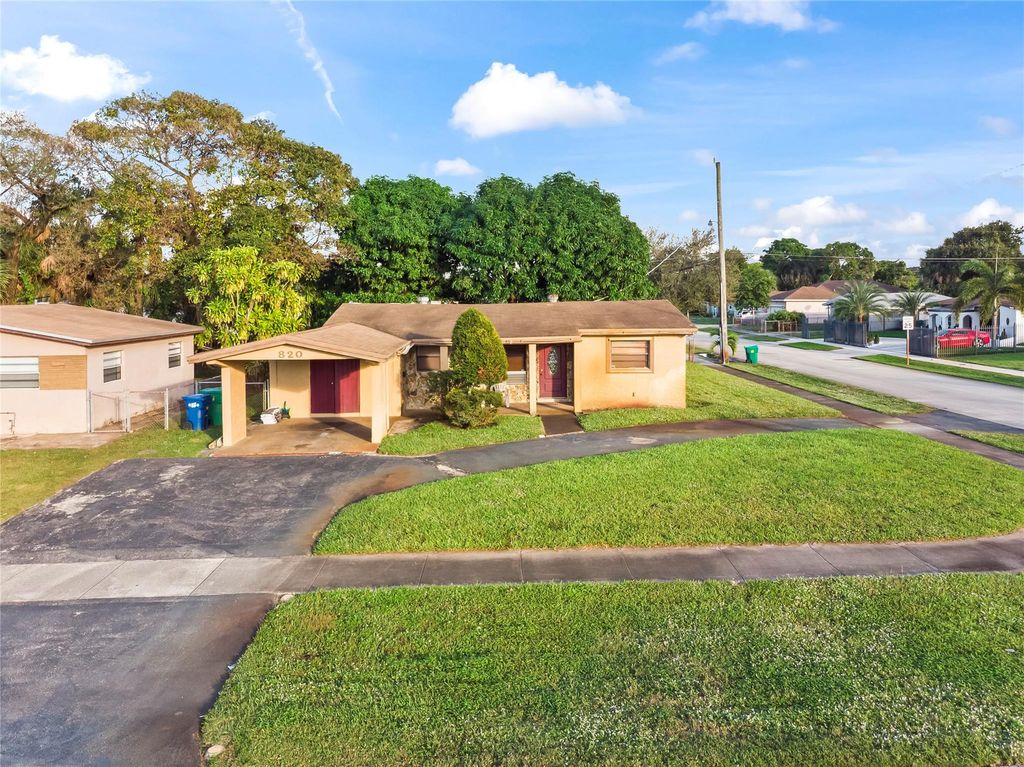 Photo of 820 NW 38th Ave, Lauderhill, FL 33311 (MLS # F10542479)