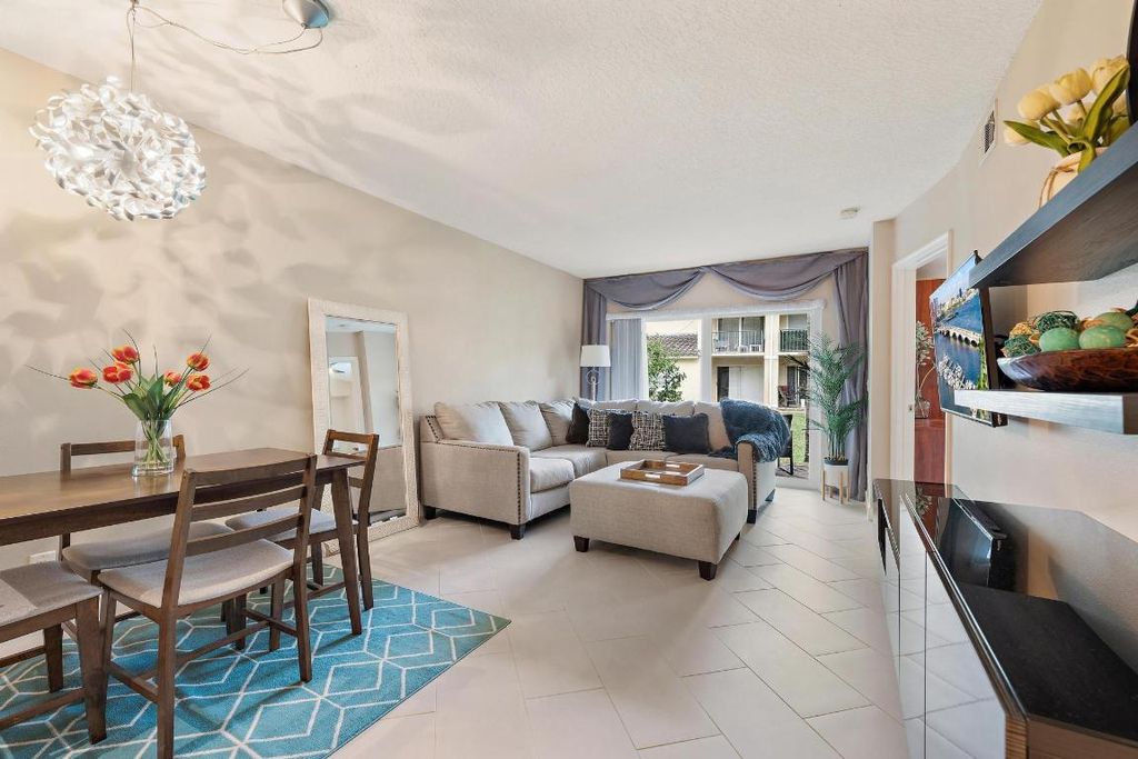 Photo of 1015 Lake Shore Drive #102, Lake Park, FL 33403 (MLS # R11154370)