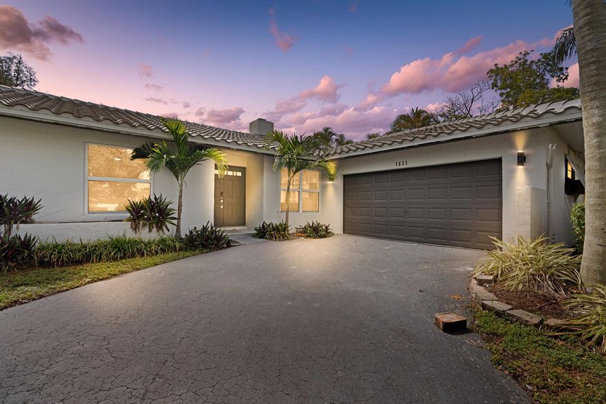 ABSOLUTELY GORGEOUS FULLY RENOVATED WATERFRONT ESTATE | PRESTIGIOUS MAPLEWOOD | EXQUISITE HIGH-END QUALITY WORKMENSHIP | NEW 2024 ROOF | Bright Open Floor Plan | Woodburning Fireplace | Dramatic Vaulted Ceilings | Recessed LED Lighting | Custom Fans | Ceramic Tile Floors | Stunning Eat-In Kitchen | Quartz Counters | Tile Backsplash | Center Island & Breakfast Bar | Custom Wine Bar | Immaculate Lush Landscaping | Large Backyard with Custom Built Pool | Covered Patio | Full Outdoor Kitchen | Impressive Primary Suite | Pool Views | Walk-In Closet | Barn Doors | Ensuite | Soaking Tub | Glass Shower | All Hurricane Impact Windows | 2-Car GA & Storage | Great Location to Parks, Fine Dining, Shops & Turnpike | Top A+ Rated Schools | No HOA Fee | NEW AC 2023 & WH 2023 | PRESENT ALL OFFERS