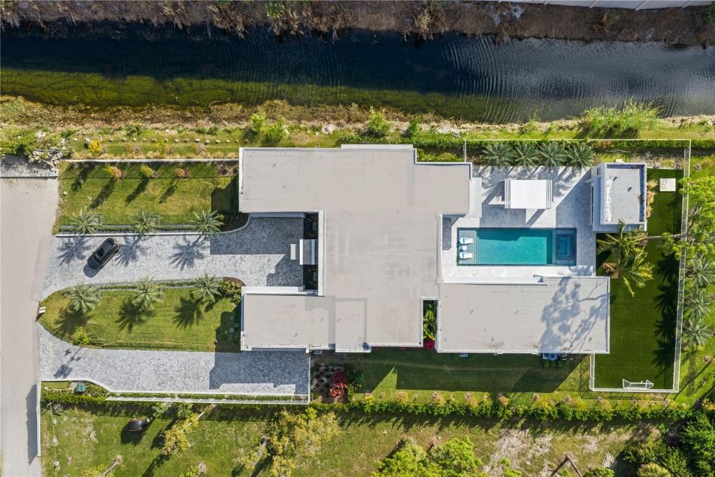 Photo of 5747 NW 63rd Way, Parkland, FL 33067 (MLS # F10537703)