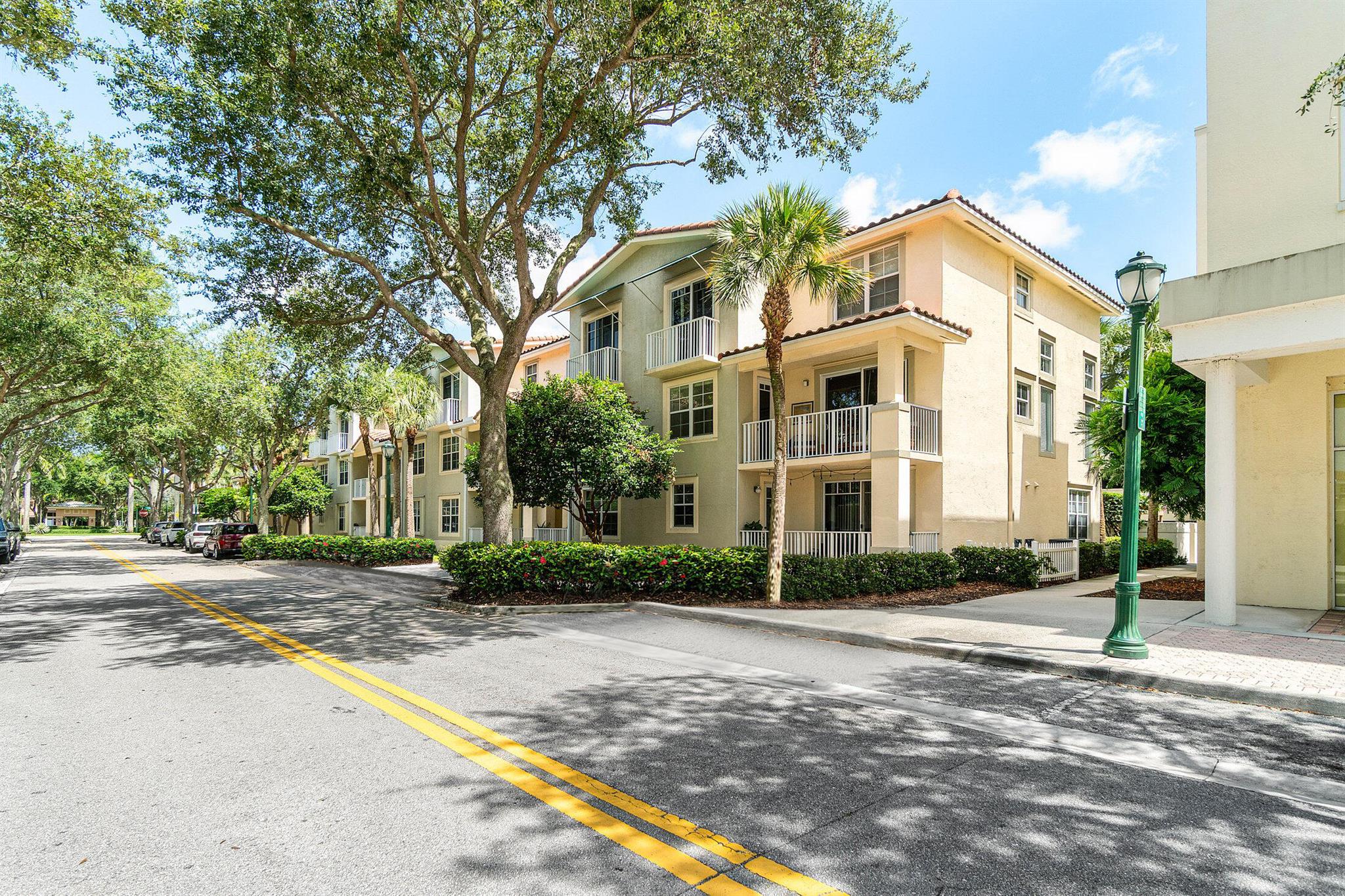 Charming 3-Bedroom, 3-Bath END UNIT in the heart of Jupiter offering the ultimate in convenience & style. Stunning soaring ceilings & floor-to-ceiling windows flood the space w/ natural light. Multiple balconies offer a perfect spot to unwind. Open staircase & 20-ft ceilings in foyer and great room add to the luxury urban feel. The updated white shaker-style kitchen serves as the heart of the home w/ cafe & dining areas, in-unit laundry, pantry, granite counters & newer appliances. Coastal style ''white oak'' vinyl plank flooring throughout gives a modern and sleek feel + easy care! Ideal floor plan w/ 1 bedroom, 1 full bath downstairs + 2 bedrooms, 2 bathrooms upstairs. Every bedroom has its own en-suite bathroom! IMPACT WINDOWS & DOORS | AC 2018 | Water Heater 2016 | Roof 2021