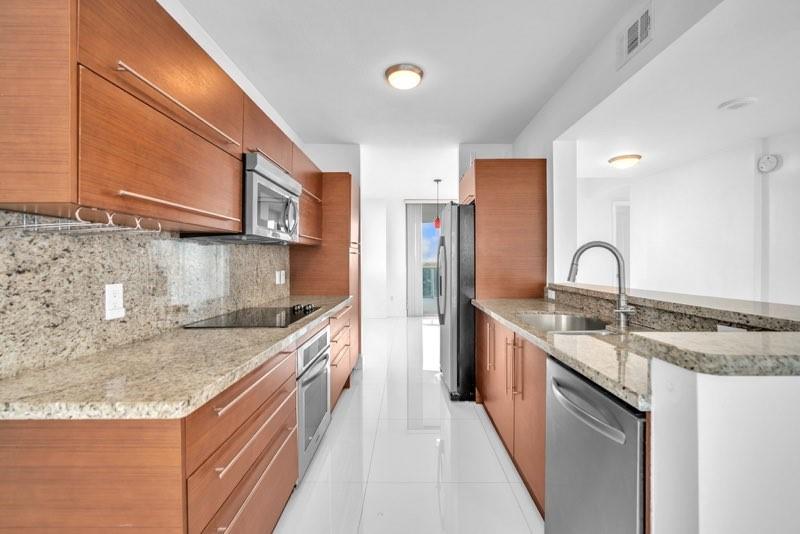 TAO SAWGRASS CONDOMINIUM - Residential Lease