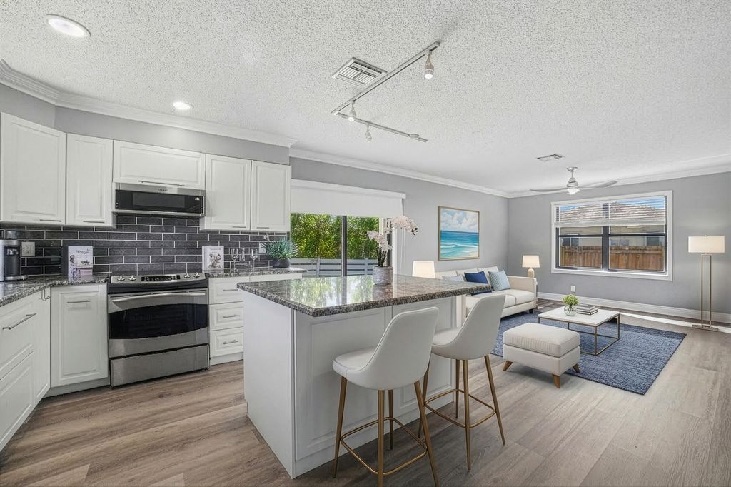 Photo of 324 W Pine Street #11, Lantana, FL 33462 (MLS # B26001029)