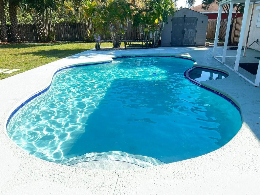 Photo of 1401 SE Belcrest Street, Port Saint Lucie, FL 34952 (MLS # R11154030)