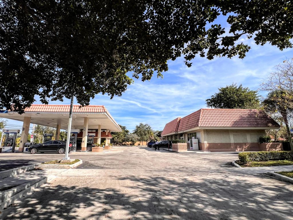 Photo of 7380 Wiles Road, Coral Springs, FL 33067 (MLS # B26013978)