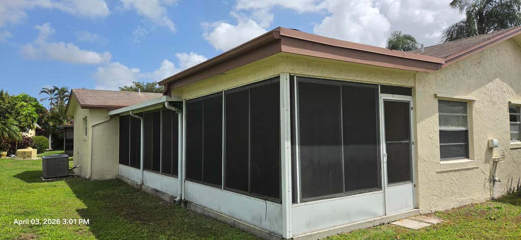 Photo of 4490 Pine Garden Lane, Lake Worth, FL 33467 (MLS # B26023088)