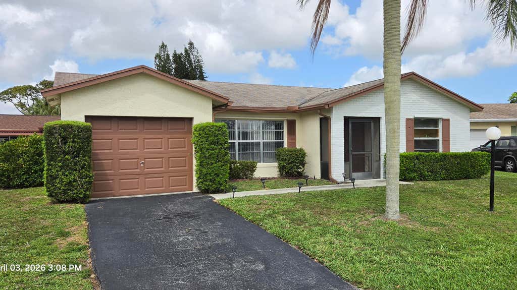 Photo of 4490 Pine Garden Lane, Lake Worth, FL 33467 (MLS # B26023088)
