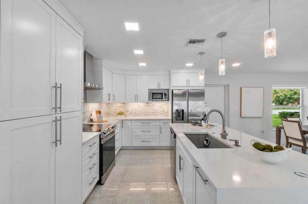 Photo of 2846 NE 35th Court, Pompano Beach, FL 33064 (MLS # R11167097)