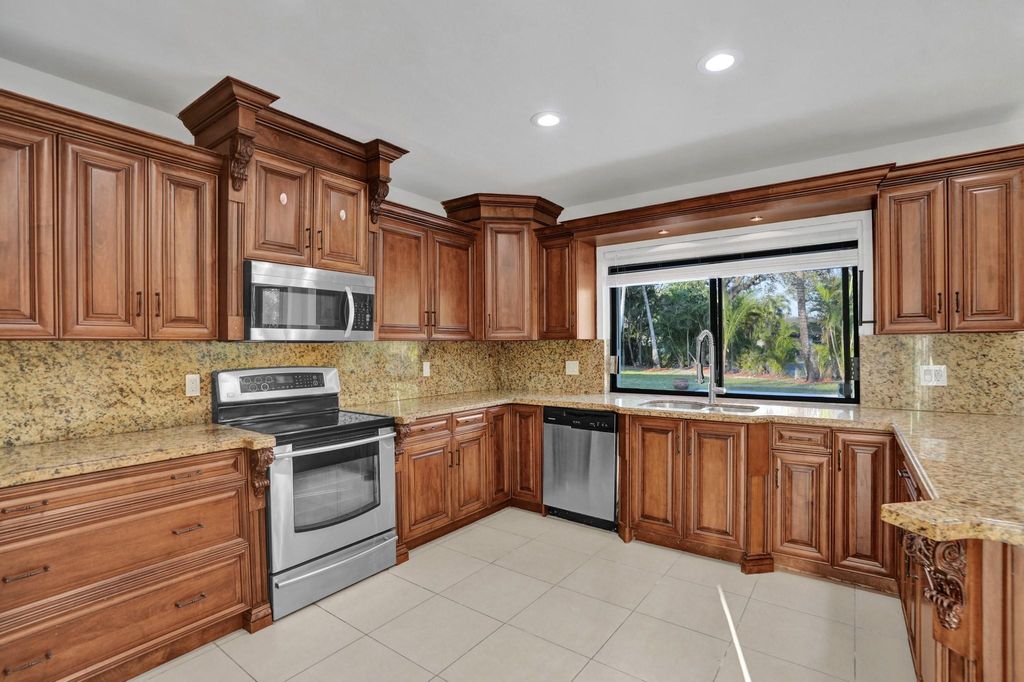 Photo of 8651 Gatehouse Road, Plantation, FL 33324 (MLS # F10476779)