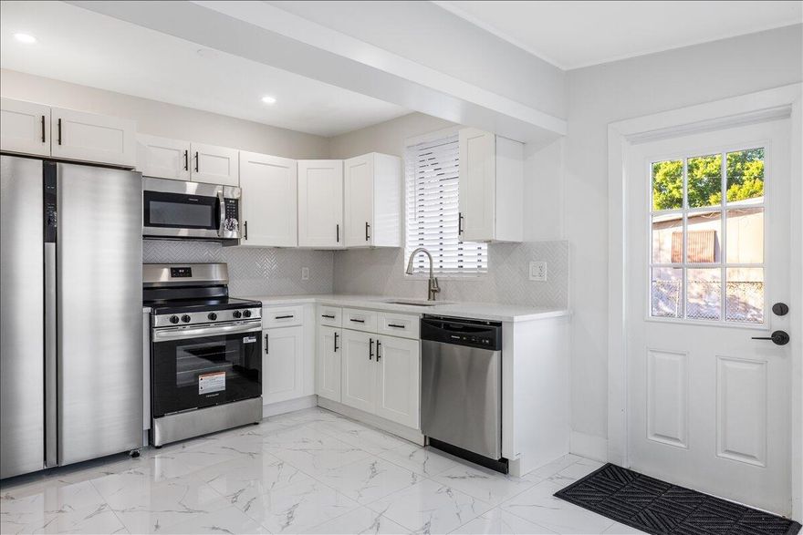 Completely renovated 3-Bed, 1-Bath home available now! This beautifully updated residence has been thoughtfully remodeled to feel brand new, offering true peace of mind. Major upgrades include a 2025 AC, 2025 shingle roof, and a 2025 hot water heater. Enjoy fresh interior paint and stunning tile flooring throughout. The kitchen shines with brand-new stainless steel Frigidaire appliances and new countertops. No detail was overlooked in this impressive renovation. Ideal as a starter home, investment property, or primary residence, Don't miss out.