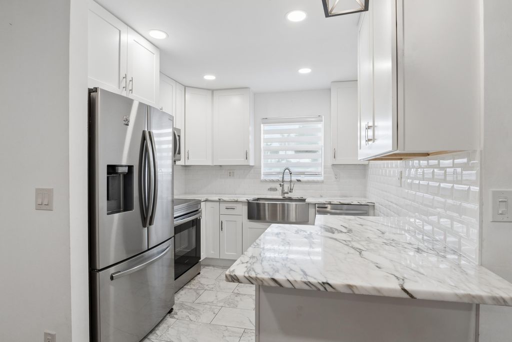 Photo of 2790 E Ashley Drive E #E, West Palm Beach, FL 33415 (MLS # R11147616)