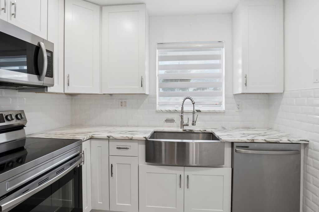 Photo of 2790 E Ashley Drive E #E, West Palm Beach, FL 33415 (MLS # R11147616)