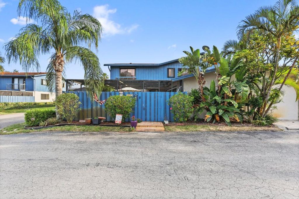 Photo of 4652 Holly Lake Drive, Lake Worth, FL 33463 (MLS # R11085532)