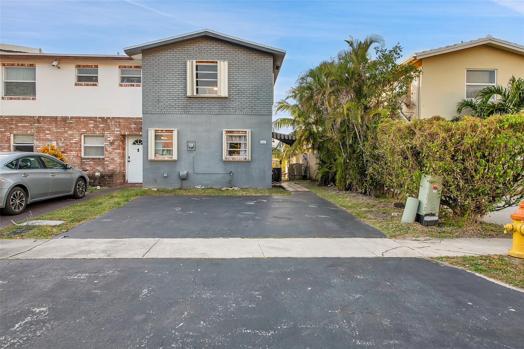 A perfect starter home. This townhome has no HOA or rental restrictions. Enjoy the private fenced in back yard with the lake and deeded dock. Enjoy the lake with your jet skis, boat, kayak, paddleboard. This home features an updated kitchen with newer appliances, bathrooms updated. Roof and A/C are only 2 years old. Vinyl flooring throughout. Endless possibilities to landscape the outside to beautify the yard. There are 2 deeded parking spots and plenty of guest parking. Property is occupied, but sellers are flexible to accommodate the buyers closing date.