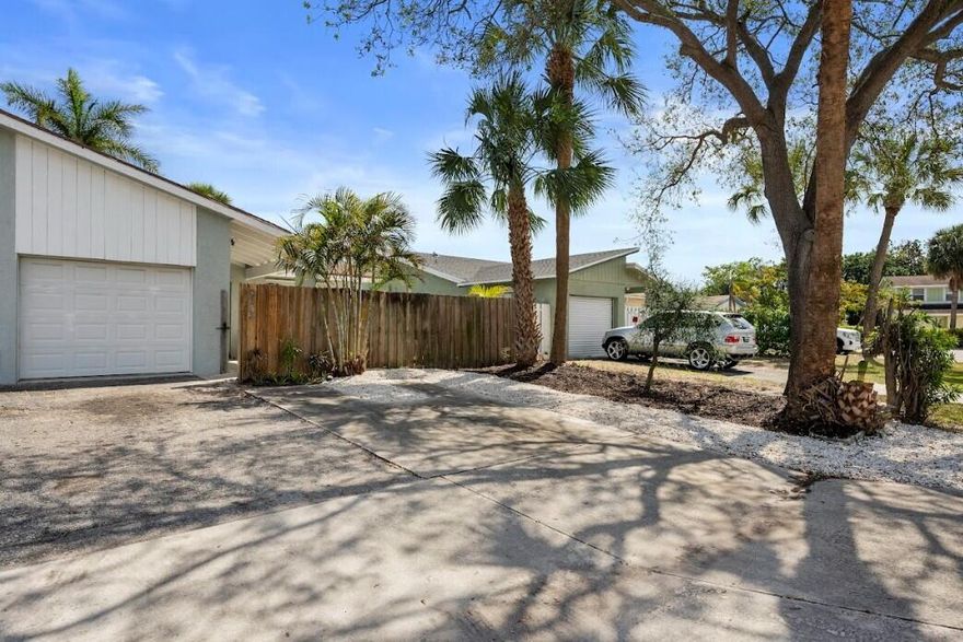 Beautiful 2-bedroom, 2-bath townhome in West Palm Beach featuring a new roof and newer A/C system. The home has been updated with luxury vinyl wood flooring throughout, a new kitchen with stainless steel appliances and white shaker cabinets, and renovated bathrooms with stylish tile floors. Enjoy a large front porch, updated landscaping, fresh interior and exterior paint, and a fenced backyard perfect for privacy and entertaining. Don't miss this incredible opportunity--homes like this won't last long!