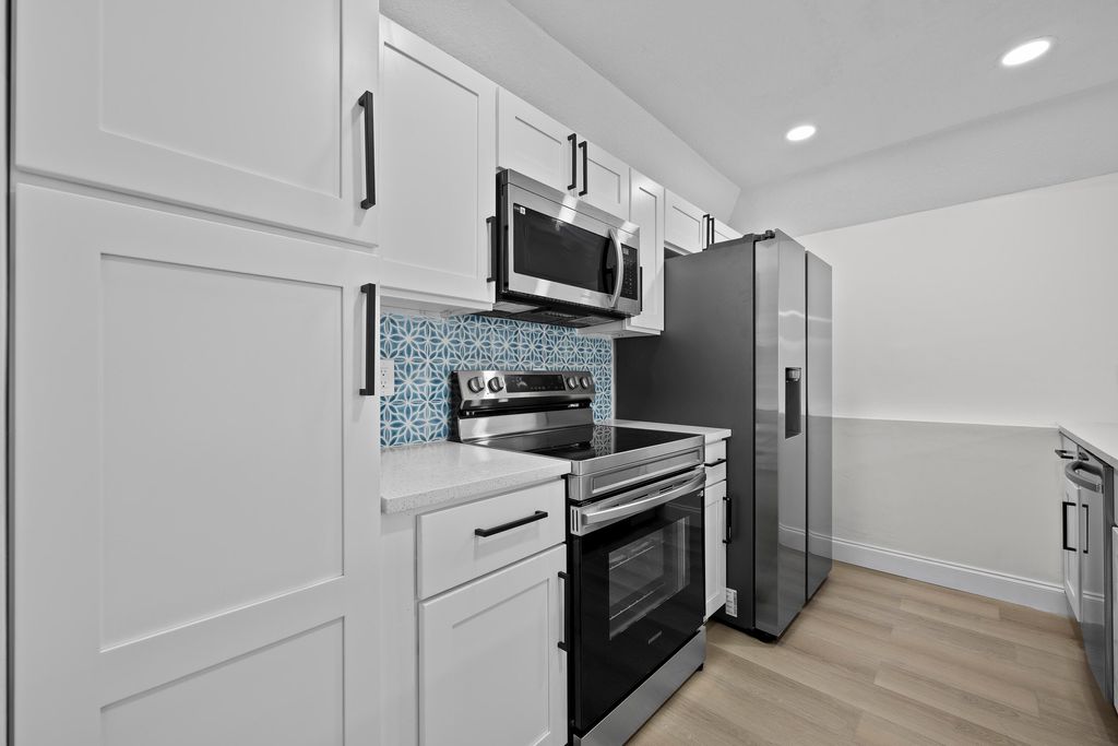 Photo of 8632 Pluto Terrace, West Palm Beach, FL 33403 (MLS # R11169031)