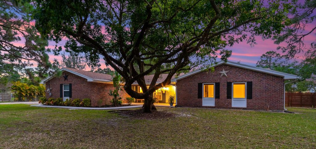 Photo of 11446 51st Court N, West Palm Beach, FL 33411 (MLS # R10954626)