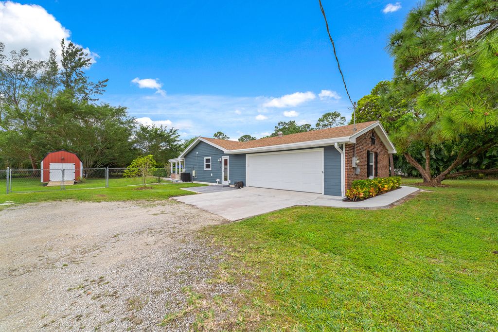 Photo of 11446 51st Court N, West Palm Beach, FL 33411 (MLS # R10954626)