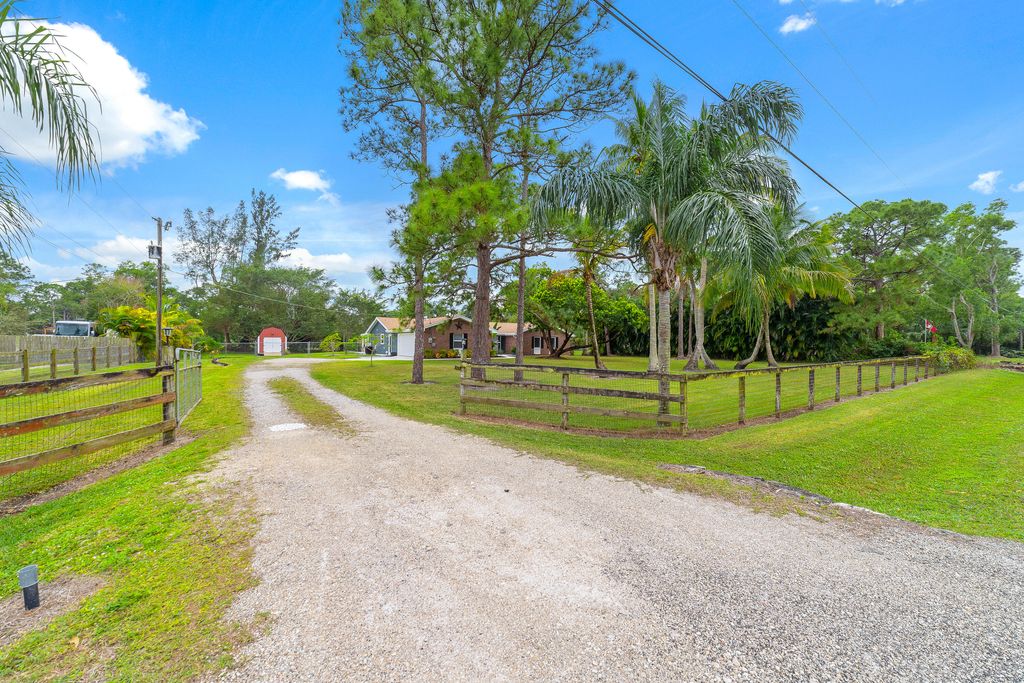 Photo of 11446 51st Court N, West Palm Beach, FL 33411 (MLS # R10954626)