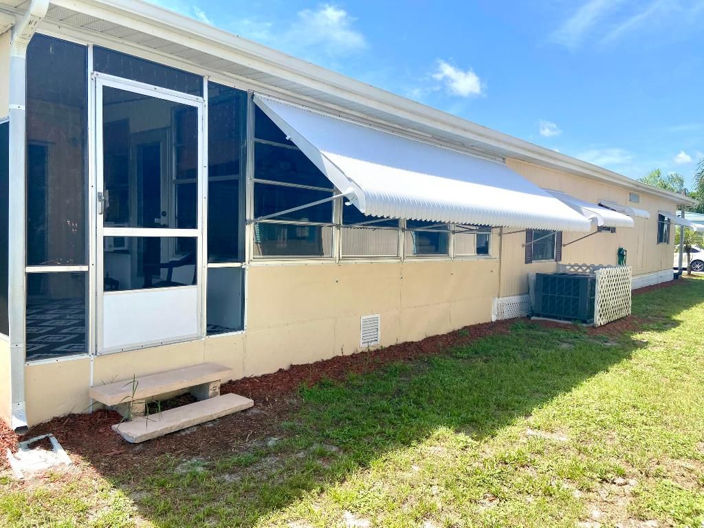 Photo of 19 Camino Del Rio, Port Saint Lucie, FL 34952 (MLS # R11119992)
