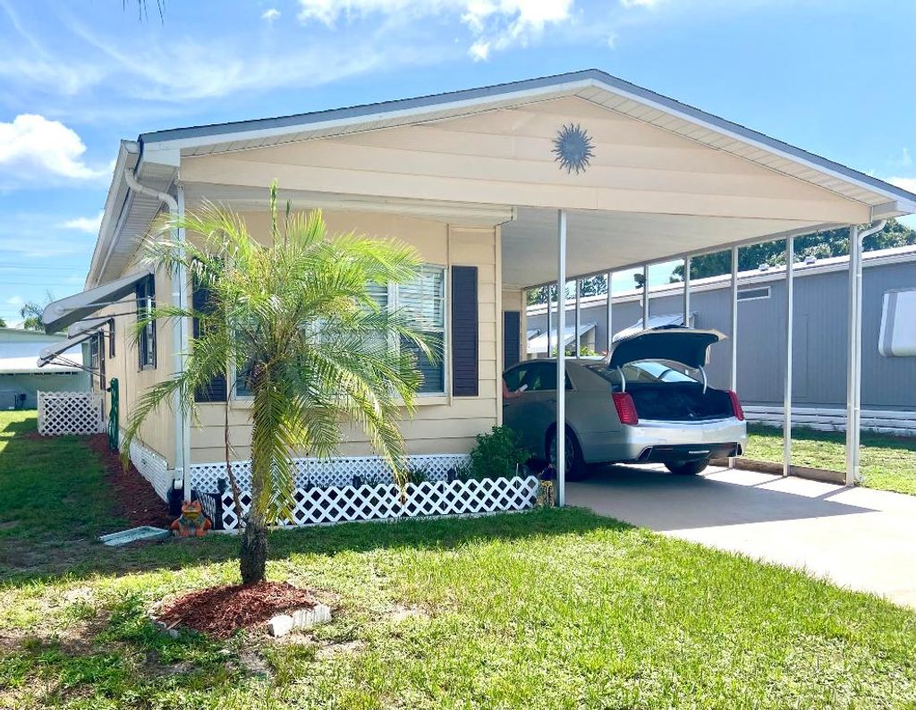 Photo of 19 Camino Del Rio, Port Saint Lucie, FL 34952 (MLS # R11119992)