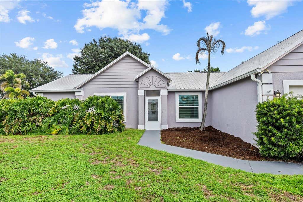 Photo of 697 SW Jeanne Avenue, Port Saint Lucie, FL 34953 (MLS # B26049967)