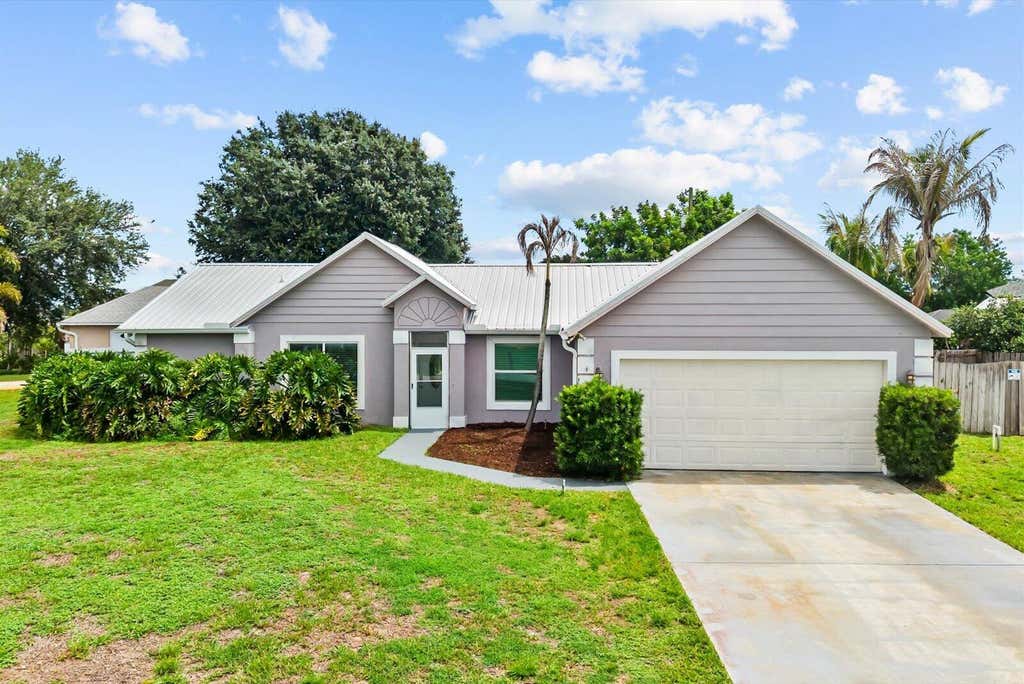 Photo of 697 SW Jeanne Avenue, Port Saint Lucie, FL 34953 (MLS # B26049967)