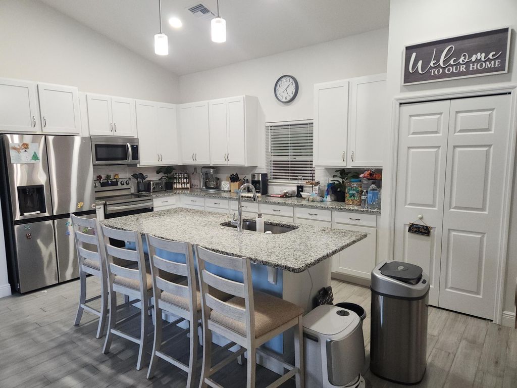 Photo of 478 SW Copperfield Avenue, Port Saint Lucie, FL 34953 (MLS # R11167162)