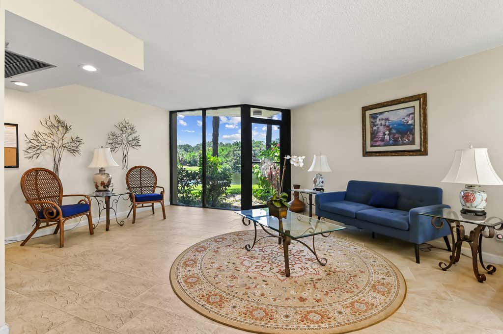 Photo of 5188 Woodland Lakes Drive #332, Palm Beach Gardens, FL 33418 (MLS # B26042471)