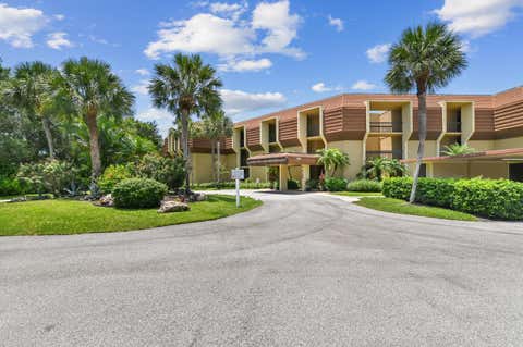 Photo of 5188 Woodland Lakes Drive #332, Palm Beach Gardens, FL 33418 (MLS # B26042471)