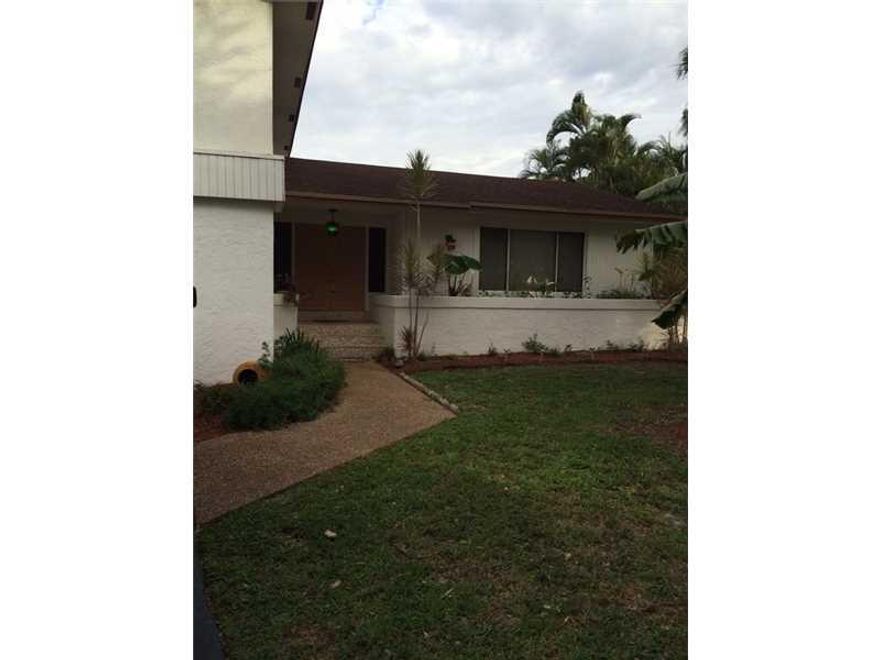 Location! Location! Don't miss this beautiful and well maintain huge single family on a cul-de-sac in a desired neighborhood in Sunrise. Split level 4+3, 2 car garage, custom porch. Big pool and a tiki hut on a spacious back yard with fruit trees. Great f or families and entertaining. Close to schools, shopping (Sawgrass Mall) and highways.  Kitchen remodeled with granite counter top, wood cabinets, new light fixtures, stainless steel appliances with glass top stove. All bathrooms remodeled, French doors.