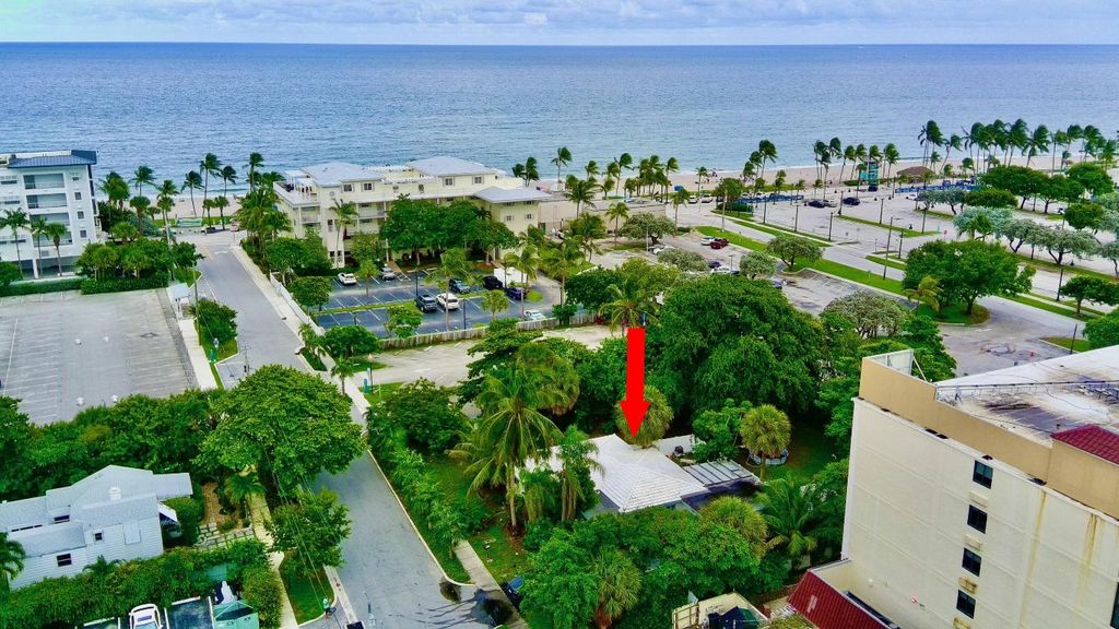 Photo of 2040 E Hillsboro Boulevard, Deerfield Beach, FL 33441 (MLS # R11125195)