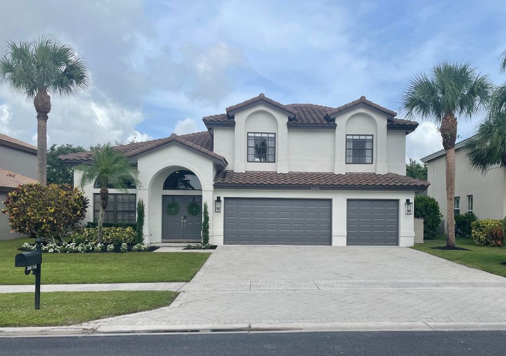 Photo of 3698 Moon Bay Circle, Wellington, FL 33414 (MLS # B26033369)