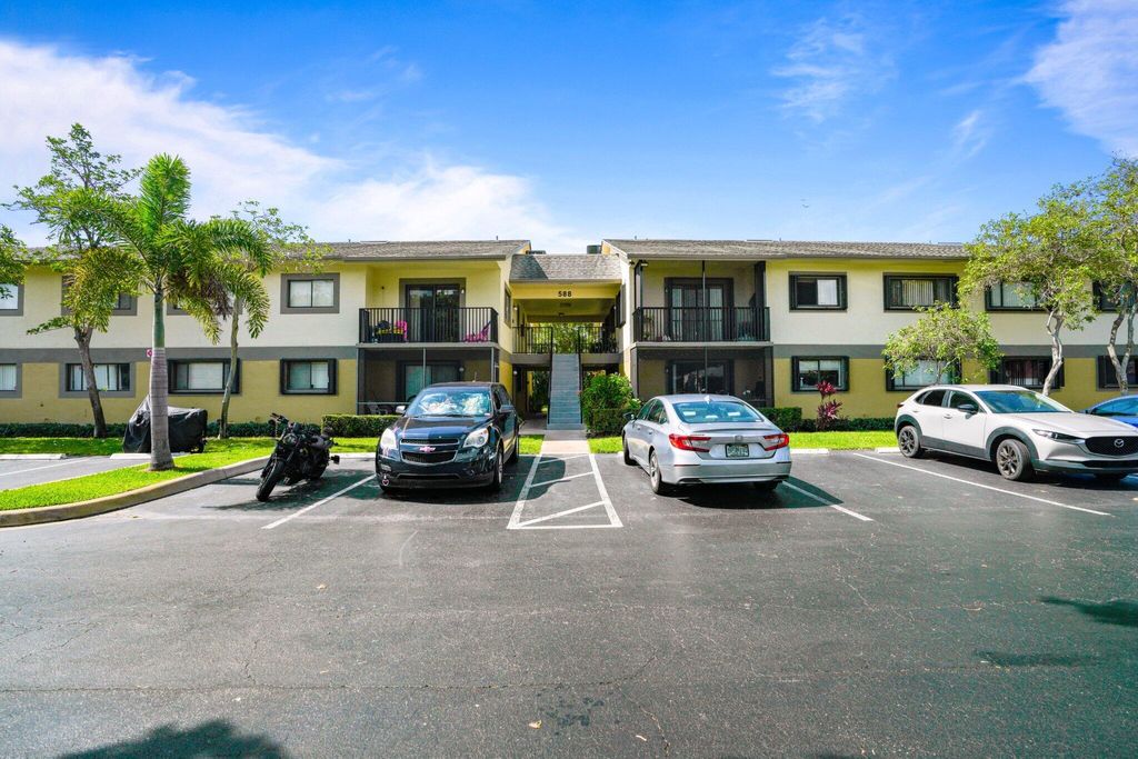 Photo of 588 Trace Circle #102, Deerfield Beach, FL 33441 (MLS # B26029831)