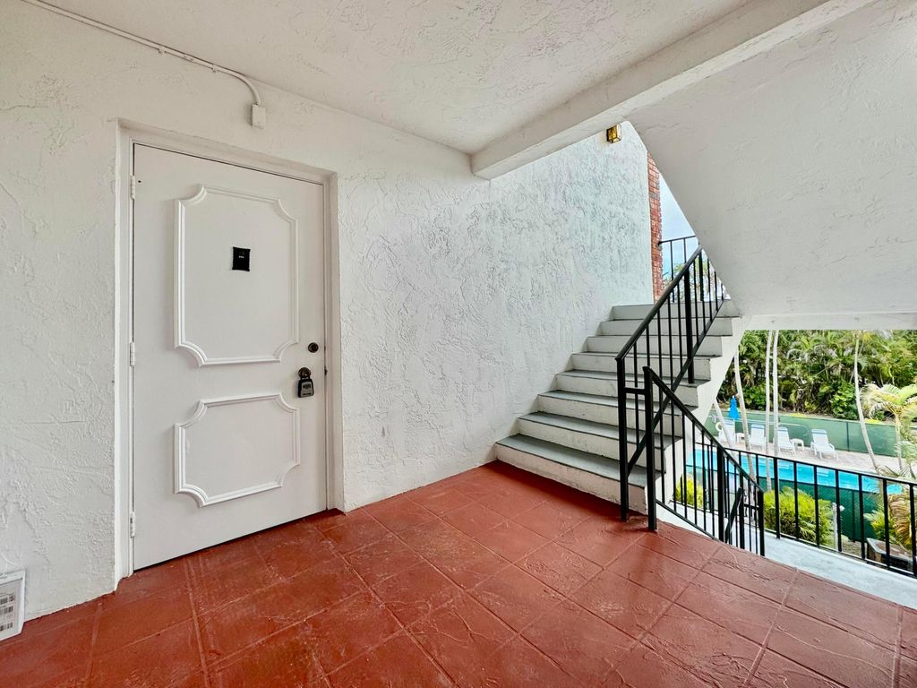 Photo of 3910 Crystal Lake Drive #301, Deerfield Beach, FL 33064 (MLS # R11064642)