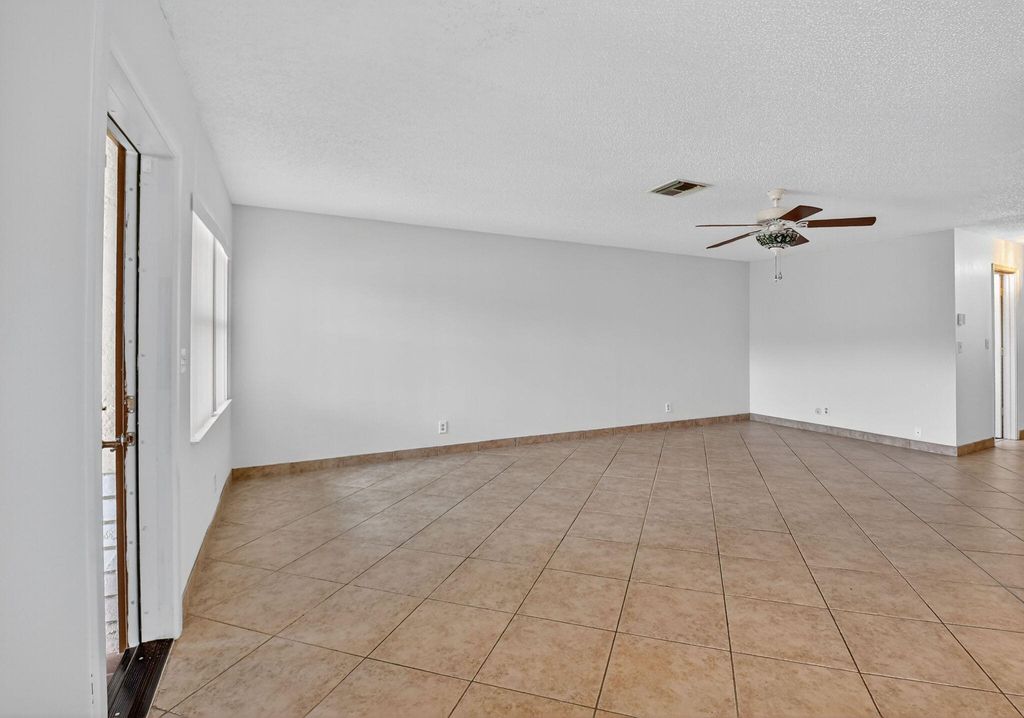 Photo of 5775 Wanda Lane, Delray Beach, FL 33484 (MLS # R11108349)