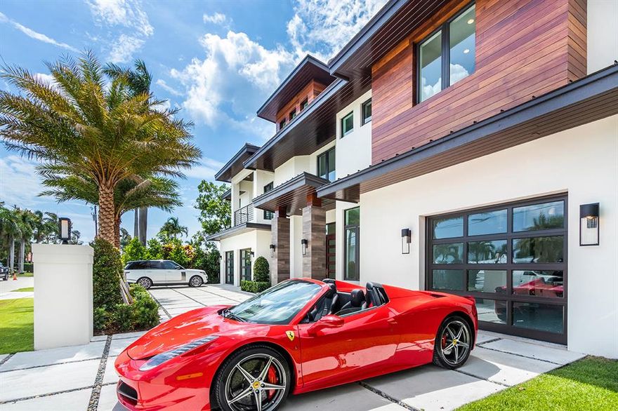 An incredible custom designed, new construction home located in Tropic Isle, Delray Beach on a deep water canal.No expense spared with this 9,000 sq ft, high tech 6 bedroom, 6 full bathroom and 3 half bath home, situated on a deep water canal and benefitting from 100 ft of water frontage.Designed to maximize the natural light in every room, this house is totally unique. Top of the line finishes throughout, spectacular chef's kitchen, impressive architectural staircase as well as a sleek elevator to all floors. Externally this house has truly been designed for entertaining. Maximizing the coveted southern exposure to the house, the spa and pool has infinity edges to all sides....