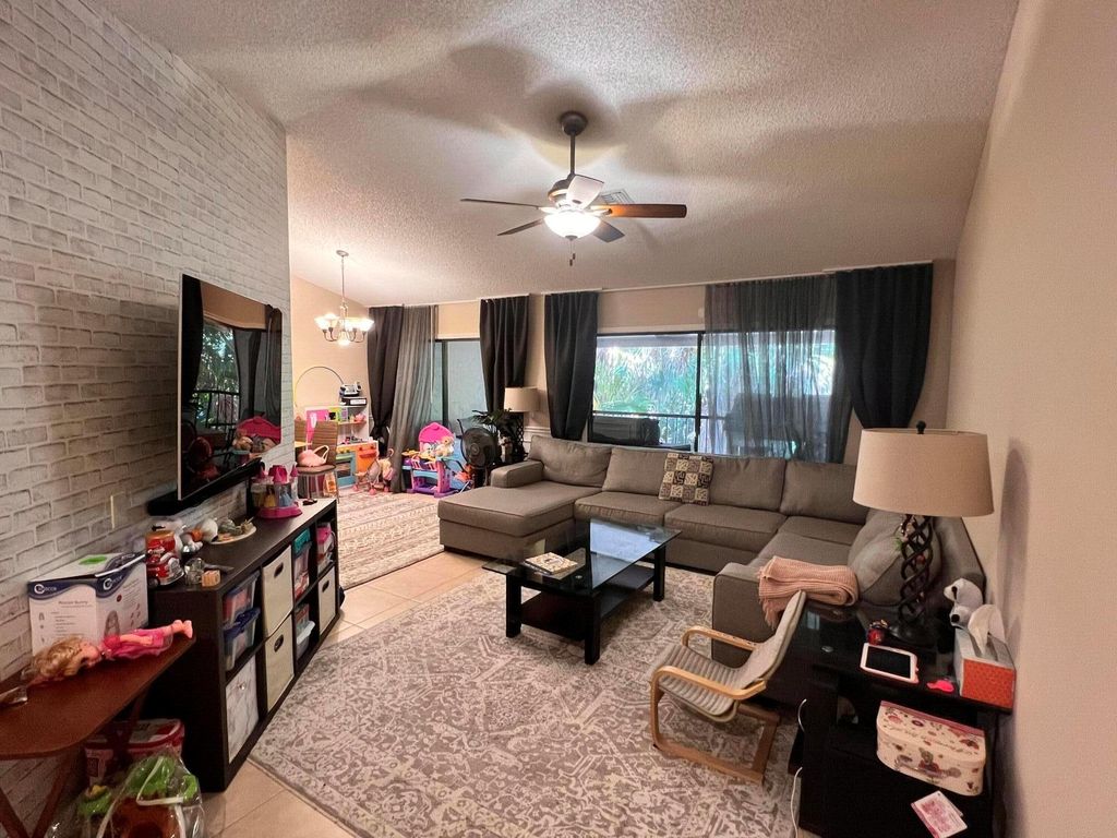 Photo of 5650 Coach House Circle #F, Boca Raton, FL 33486 (MLS # R11101856)